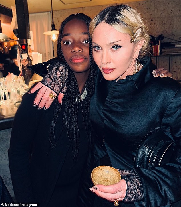 In another image, Madonna posed with one of her 12-year-old adopted identical twin daughters Stella and Estere