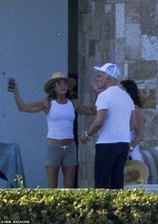 Jennifer seemed very passionate about their conversation during the beach trip, with the star spreading her arms mid-conversation to emphasize her point