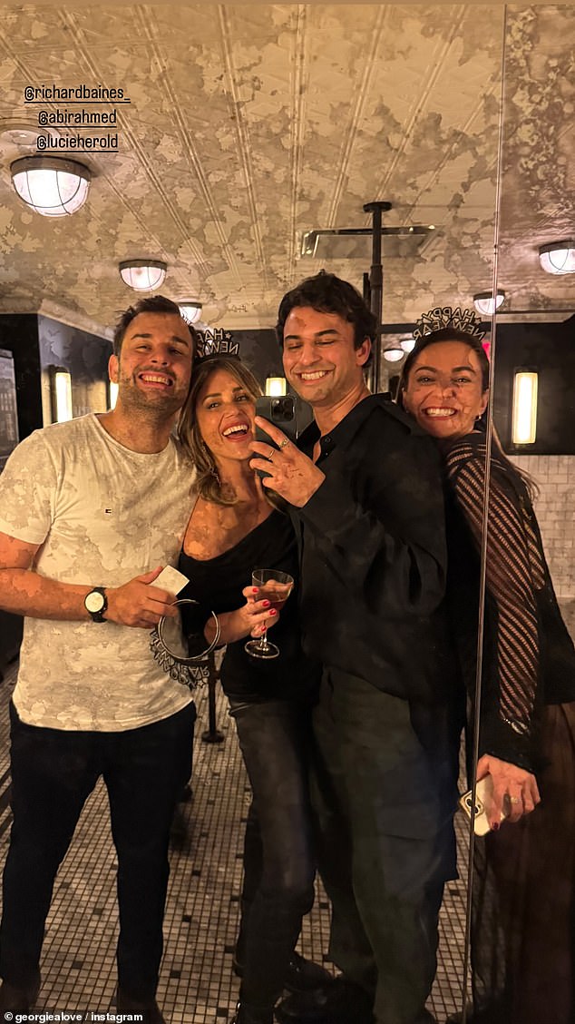 Georgia shared a photo of herself playfully posing with friends Richard Baines, Abir Ahmed and Lucie Herold