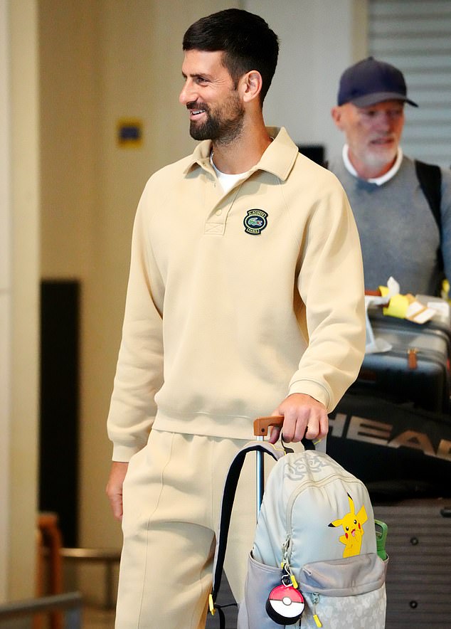 Djokovic, 37, was recently spotted by an eagle-eyed supporter wearing a gray Pikachu backpack (pictured) as he walked into Brisbane airport