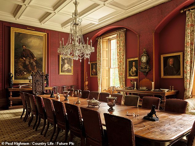 The large rooms feature beautiful ceilings and paintings