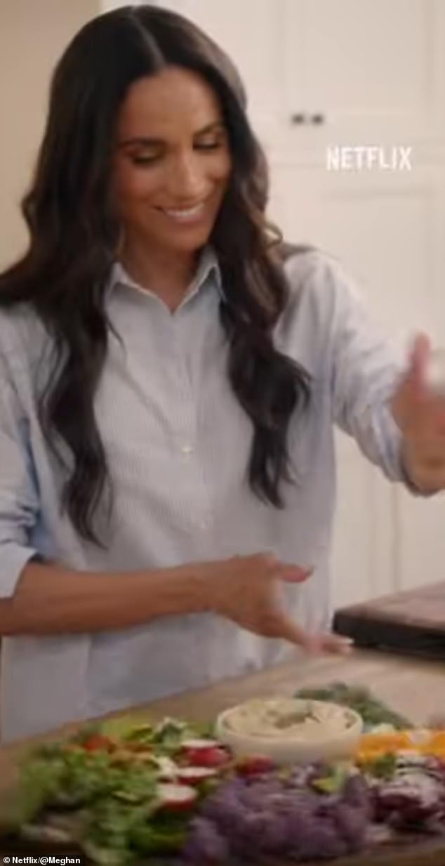 Meghan, 43, is pictured in her Montecito kitchen cooking during the trailer for the series, which drops on Netflix on January 15