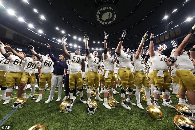 Freeman later led the Notre Dame players in an emotional rendition of the school's fight song