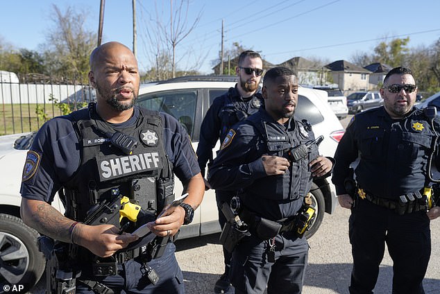 Harris County sheriff's deputies clear media from neighborhood where 42-year-old suspect Shamsud-Din Bahar Jabbar allegedly lived