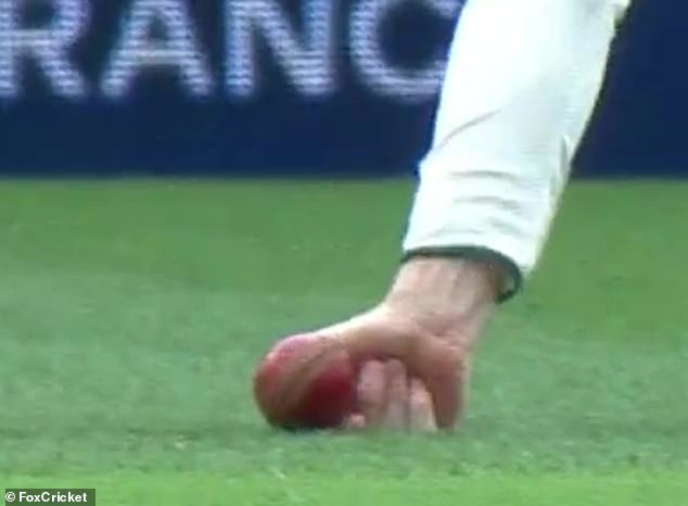 However, third referee Joel Wilson ruled that Smith had failed to prevent the ball hitting the ground after examining a slow motion replay (pictured)