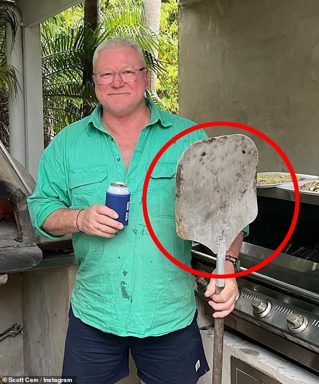 In the photo, Scott, 62, is seen holding a short-handled shovel and a wide spade, which followers mistook for a stingray.