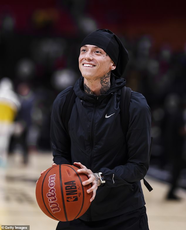 The tattooed hitmaker, 26, looked in good spirits as he shot some hoops after the match