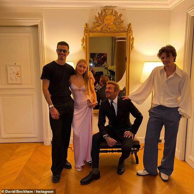 David also shared a photo taken on the day of Victoria's Paris Fashion Week show with his sons Romeo and Cruz and daughter Harper