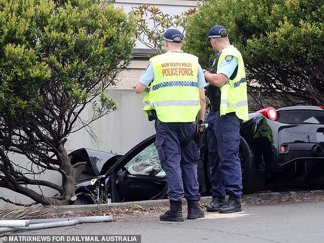 The luxury vehicle (pictured) crashed through a brick fence before crashing into a wall at Robertson Place in Watsons Bay, in Sydney's eastern suburbs, on Thursday afternoon.