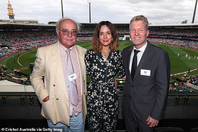 The Two Hands star was accompanied by her father Robin and at one point the pair happily posed next to American tennis star Jim Courier