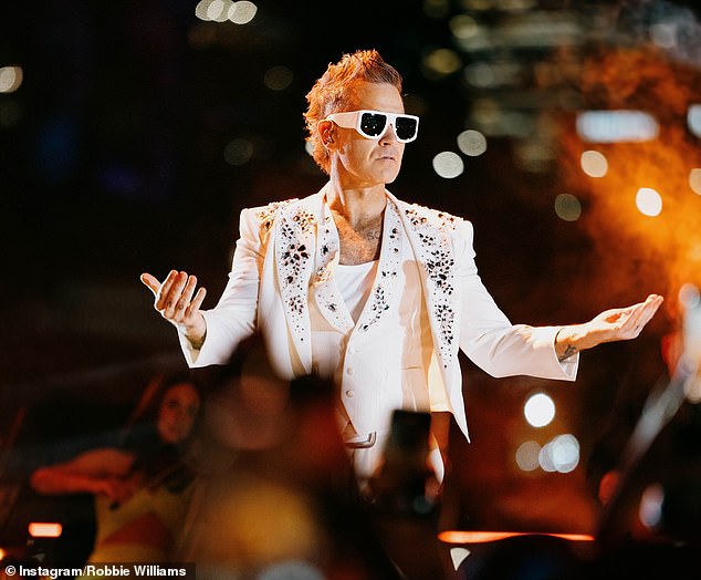 The British megastar, 50, admitted he was struggling with mental health 'demons' as he performed on stage in front of thousands of fans, almost interrupting his show