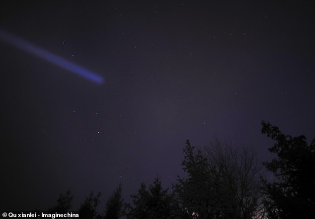 The Quadrantids come from an 'extinct' comet called 2003 EH1. The high levels of magnesium and other metals in the debris of this rocky body can give the meteors a blue flash. Pictured: A fireball from the Quadrantids meteor shower over Shandong, China