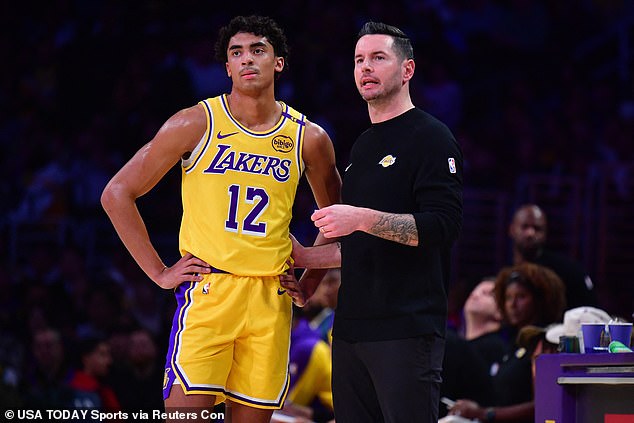 Lakers head coach JJ Redick speaks with guard Max Christie in Los Angeles on Tuesday