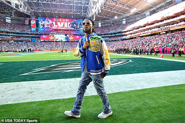 Hamlin walks the sidelines before Super Bowl LVII at State Farm Stadium in Arizona