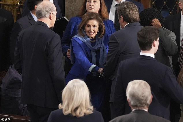 Pelosi greets lawmakers as they arrive at the House of Representatives for the new 119th Congress on Friday