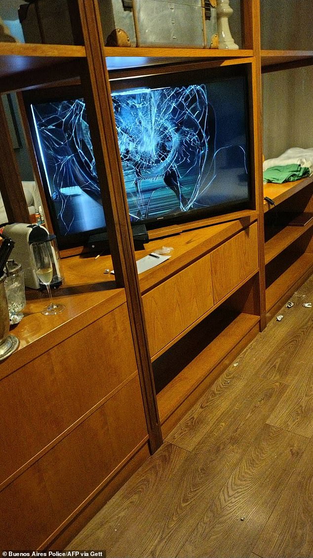 A broken TV in Liam Payne's hotel room and a glass of champagne