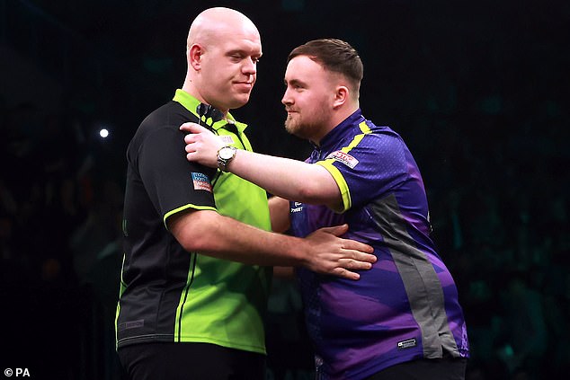 He is the favorite to take the title tonight when he takes on Michael van Gerwen (left)