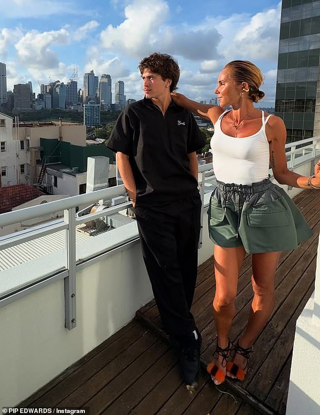 In the photos, the mother-son duo partied with some of her friends on the roof of an apartment building overlooking Sydney Harbor