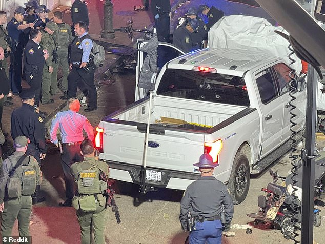 Above, investigators swarm Jabbar's truck in New Orleans after he crashed into pedestrians celebrating the New Year. His attack killed at least fourteen people and injured dozens of others