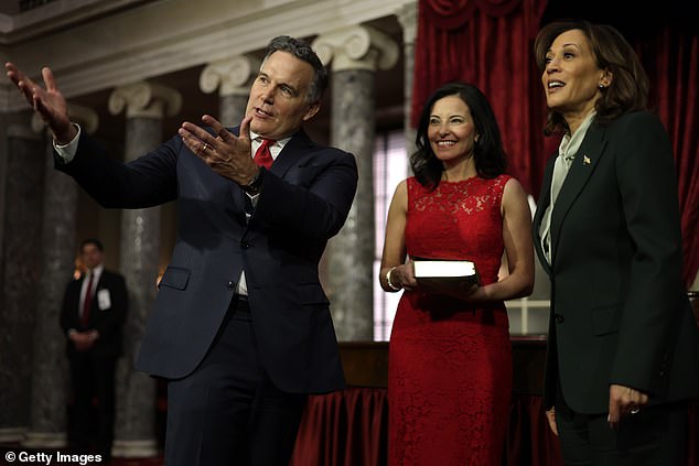 Newly sworn-in Republican Senator from Pennsylvania David McCormick with his wife Dina Powell (center) introduces the vice president to five of his six daughters who were present for his swearing-in