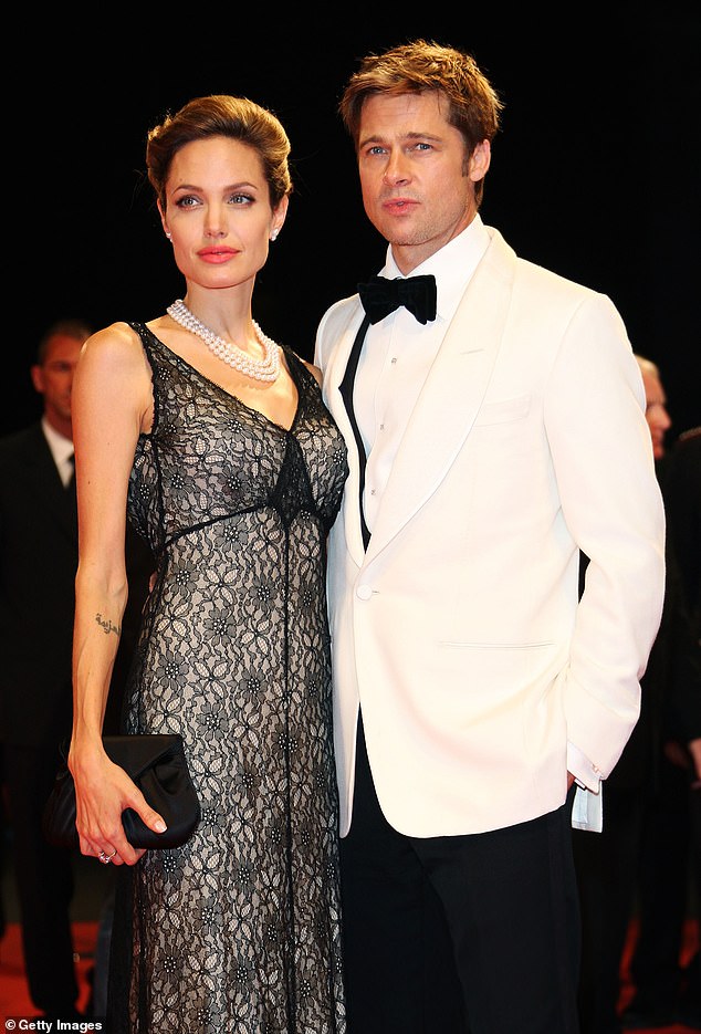 Brad and Angelina reached a settlement and signed divorce papers on Monday, December 30, but are still in dispute over their $62 million Chateau Miraval; Angelina and Brad seen in 2007