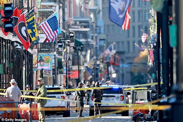 Law enforcement officers from multiple agencies are working on scene on Bourbon Street