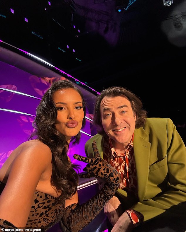 She also added a glamorous selfie with fellow judge Jonathan Ross, who cut a dapper figure in an olive green blazer and funky red and white shirt.