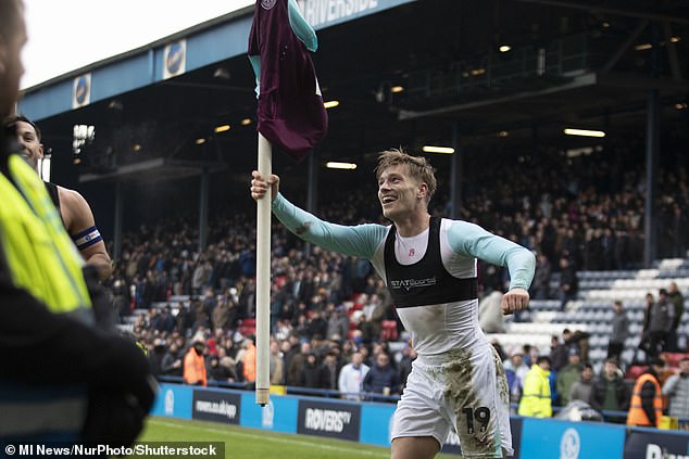 The Dutchman pulled his shirt over a Blackburn corner flag and paraded it after full-time