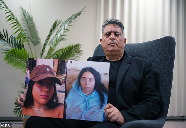 Eli Albag, Liri's father, holds up two images, one of his daughter before the war and one of her in Hamas captivity