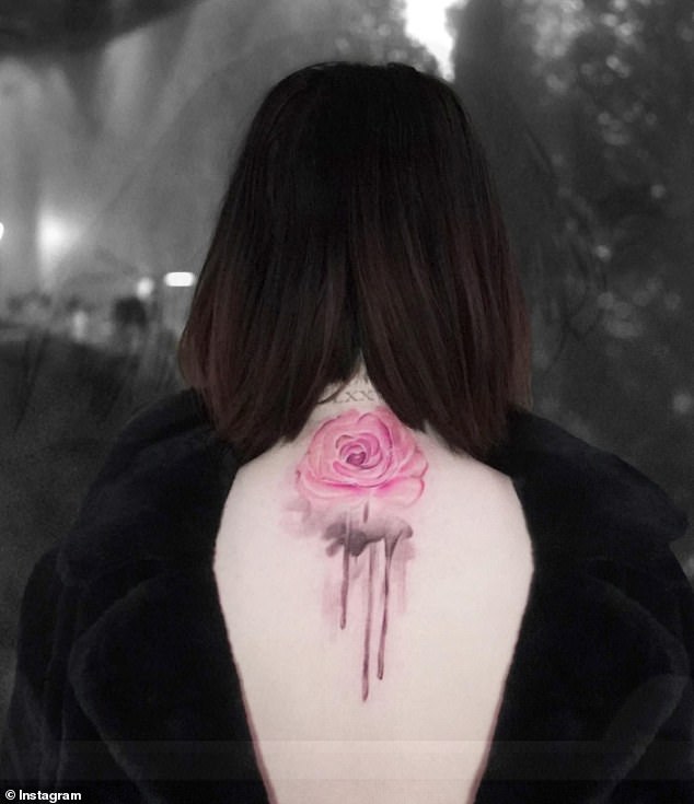 She also has a pink watercolor rose, which she got in 2021, inspired by her friend Cara Delevingne