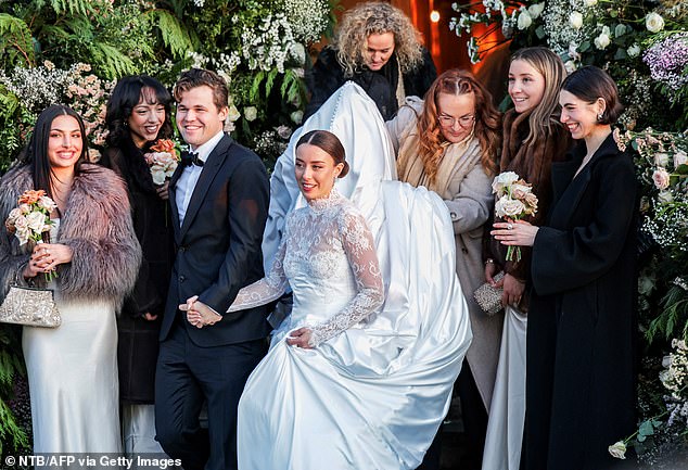 The bride, 26-year-old Ella Victoria Malone, looked stunning as she donned a classic white dress with a full skirt and lace sleeves