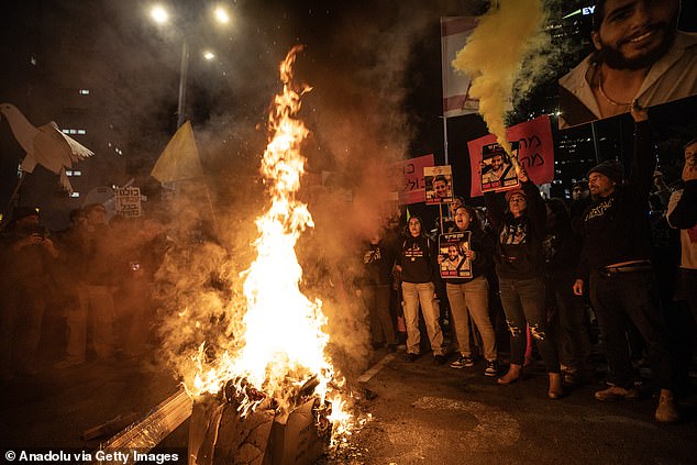 Anti-government protesters set up several bonfires in the streets of Tel Aviv this evening