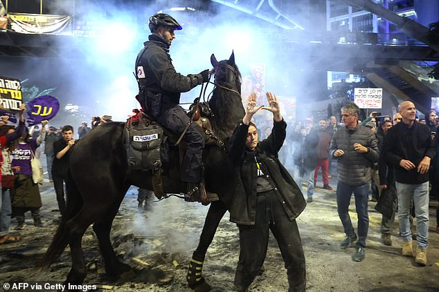 Officers on horseback were seen wading through the crowd of protesters