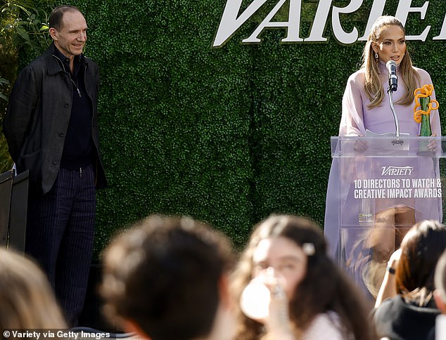 “We really need to stop meeting in hotels like this,” JLo, 55, joked after Ralph, 62, brought her on stage at Variety's 10 Directors To Watch And Creative Impact Awards