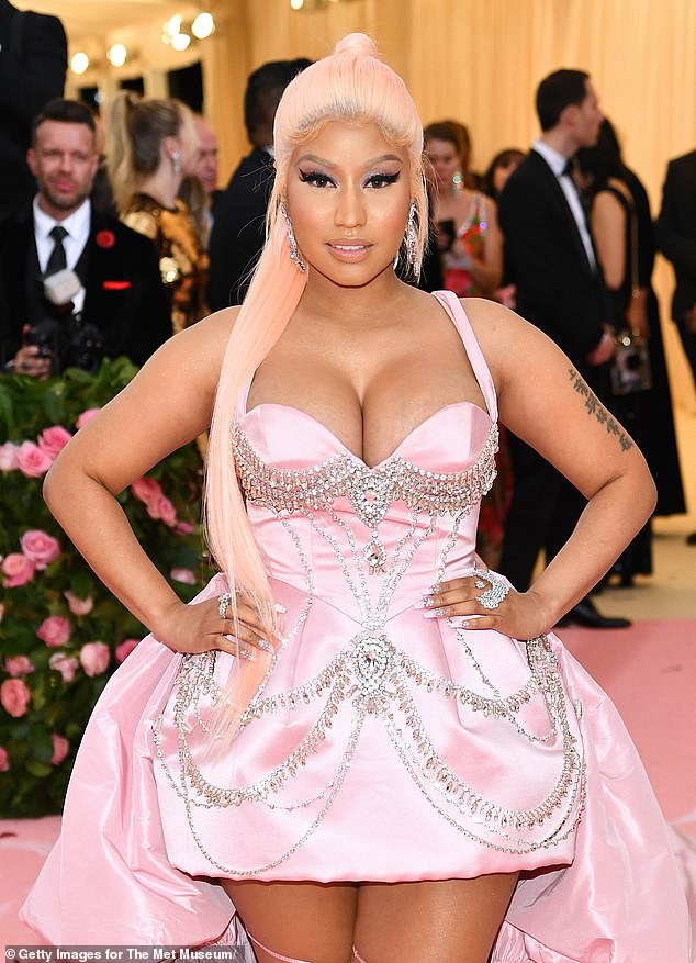 According to a report from TMZ, Detroit police have filed a warrant with the Wayne County Prosecutor's Office, which is now under investigation to determine whether criminal charges will be filed against 42-year-old Minaj for battery and intentional infliction of emotional distress. ; in the photo in 2019