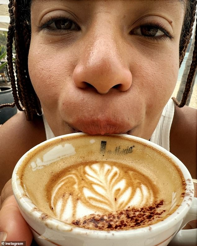 The footballer also captured a close-up of Mary enjoying a cappuccino and falling asleep on the plane