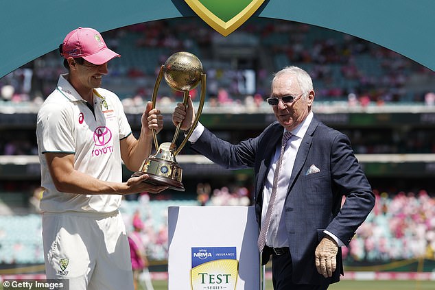 Allan Border (right) presented the Border-Gavaskar Trophy to Pat Cummins (left) on Sunday afternoon after Australia claimed a 3-1 win in the series