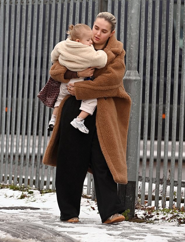 And she looked in good spirits as she stepped out with their daughter on Sunday after appearing to confirm they had rekindled their relationship.