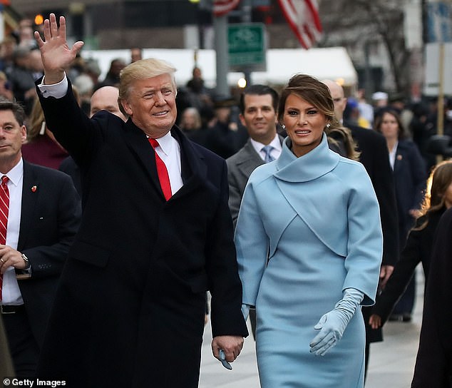 Melania Trump returns to Washington, DC this month after her husband Donald Trump won re-election in November. Pictured: The former and future first couple walk the route during their first opening parade on January 20, 2017