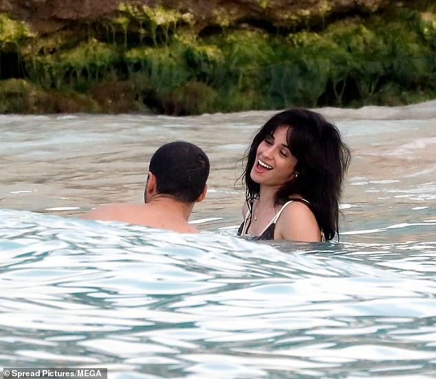 Cabello beamed with joy as she beamed at her boyfriend at one point while swimming