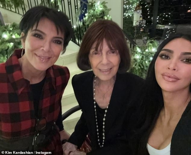 For the final photo, Kim showed off her plump pout as she posed next to Kris and grandmother MJ (Mary Jo).