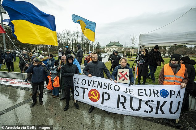 Hundreds of people take part in a protest on Freedom Square in Bratislava, Slovakia, on December 23, 2024, after Slovak Prime Minister Robert Fico visited Moscow on December 22 to meet Russian President Vladimir Putin