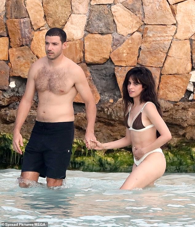 During their trip to St. Barts, the 27-year-old singer and her secret billionaire boyfriend Henry Junior Chalhoub, 38, couldn't keep their hands off each other