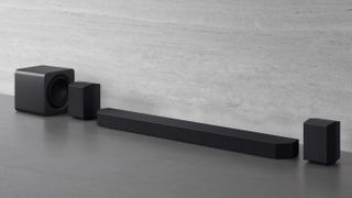 Samsung Q990F soundbar system against gray background