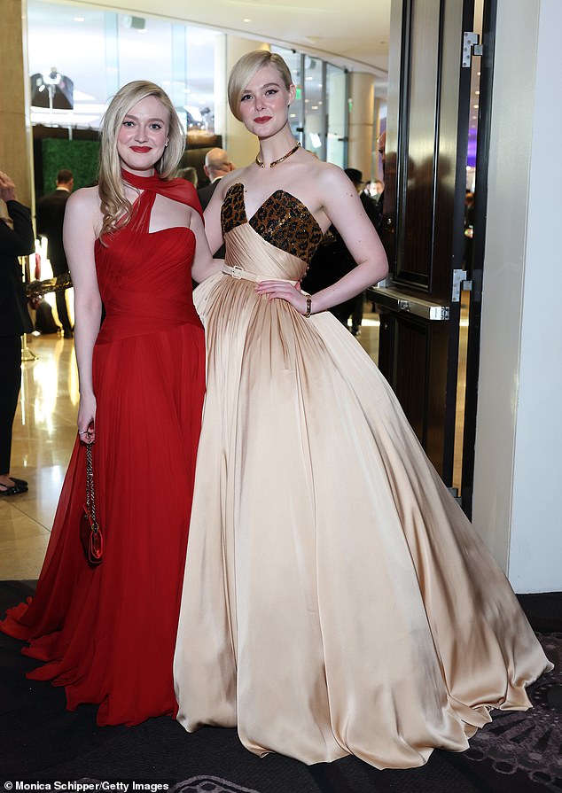 Hours earlier, Fanning was glamorous in a red Dolce & Gabbana gown, while her younger sister wore a custom replica of a Pierre Balmain haute couture FW/53 ball gown — both selected by stylist Samantha McMillen.