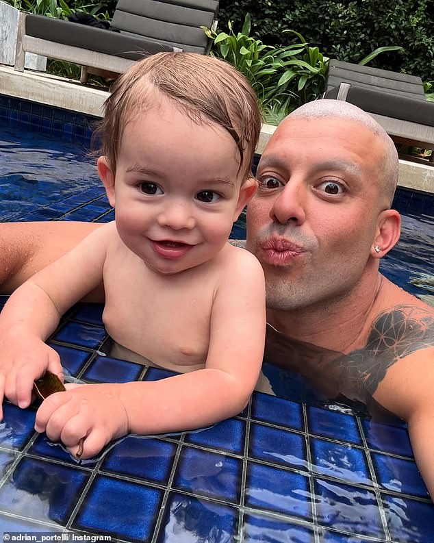 In the latest photo, the father-son duo was seen smiling and pouting while swimming in their backyard pool