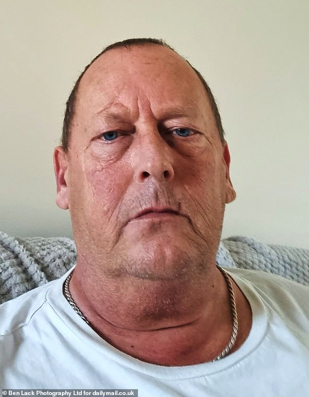 Andrew Trafford (pictured) is 'disgusted' that NHS bosses have failed to sack a worker who secretly filmed his wife as she suffered a mental breakdown