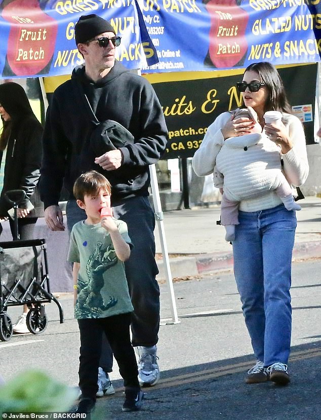 The couple looked relaxed as they wandered around the area with Callum, who turns six in March, and Rhiannon, about six months old.