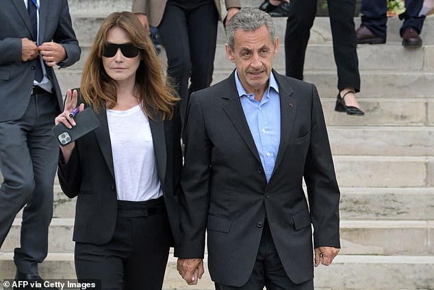 Carla Bruni (left, pictured with her husband in June 2024) is accused of being part of a £4 million campaign called 'Operation Save Sarko' – a complex and illegal scheme to try to bail her husband out of prison keep