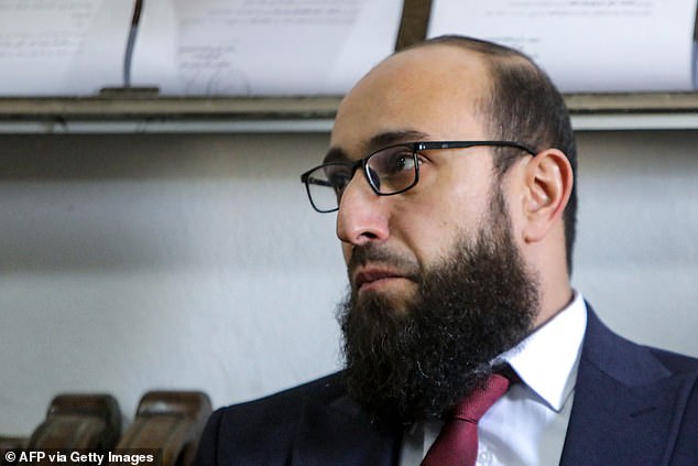 Above is Shadi Mohammad al-Waisi, the Minister of Justice in the new Syrian government